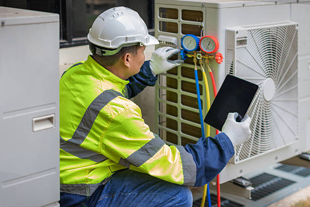 Professional Heat Pump Repair technician working in Kew Gardens, NY